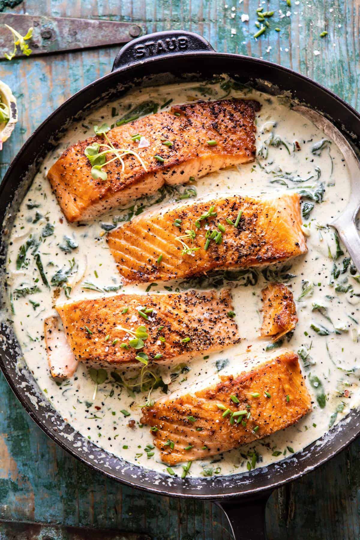 Garlic Butter Creamed Spinach Salmon | halfbakedharvest.com #salmon #easyrecipes #seafood #dinner