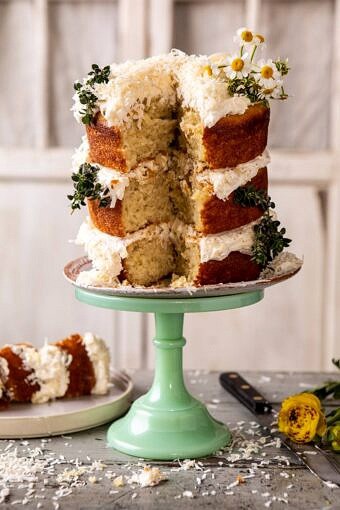 Lemon Coconut Naked Cake with Whipped Vanilla Buttercream | halfbakedharvest.com #coconutcake #springrecipes #easter #cake #layercake
