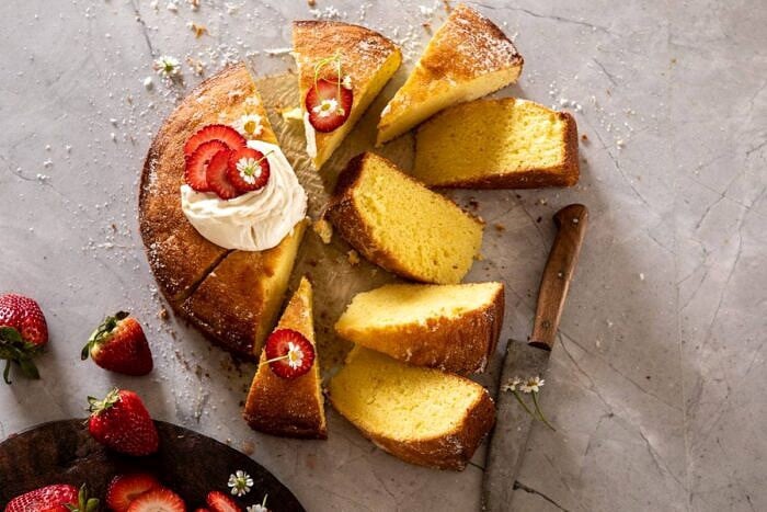 Strawberry Chamomile Olive Oil Cake with Honeyed Ricotta | halfbakedharvest.com #cake #dessert #springrecipes #Easter #strawberry horizontal photo of Strawberry Chamomile Olive Oil Cake with Honeyed Ricotta