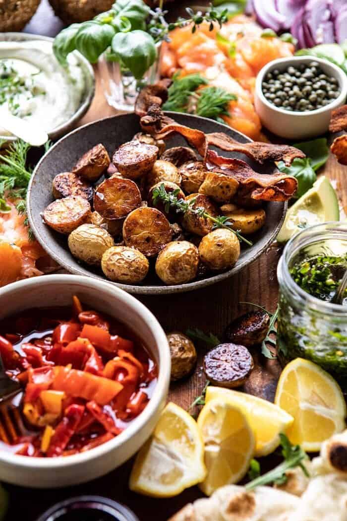 side angle photo Ultimate Spring Brunch Board, close up on roasted potatoes 