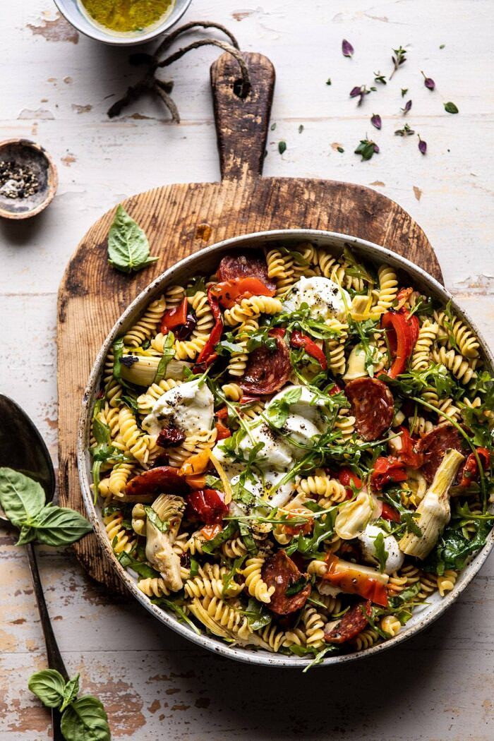 Antipasto Pasta Salad with Herby Parmesan Vinaigrette | halfbakedharvet.com #pasta #easyrecipes #pastasalad #mothersday overhead photo of Antipasto Pasta Salad with Herby Parmesan Vinaigrette