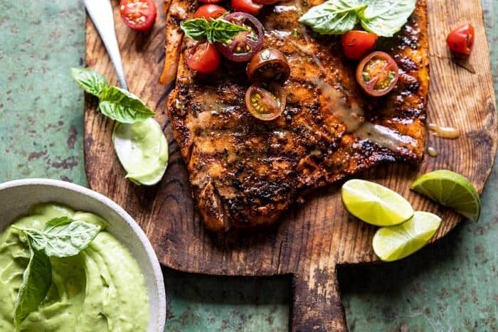 Honey Mustard Grilled Salmon with Avocado Basil Sauce | halfbakedharvest.com #grilling #salmon #summer #healthyrecipes horizontal photo of Honey Mustard Grilled Salmon with Avocado Basil Sauce