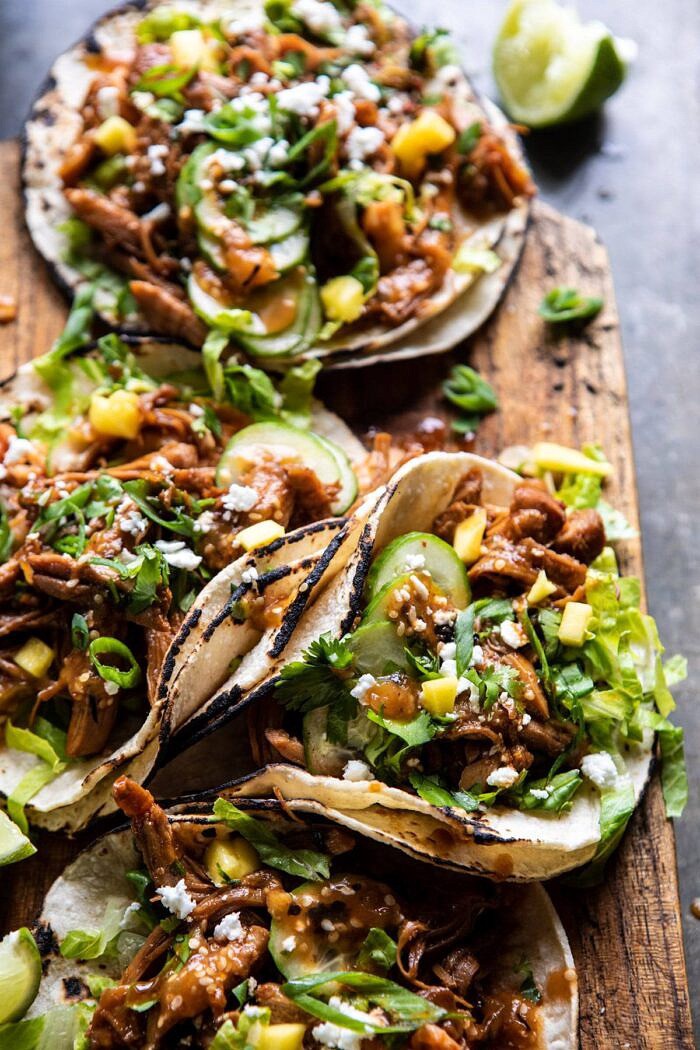 Instant Pot Korean Bulgogi BBQ Tacos | halfbakedharvest.com #tacos #instantpot #easyrecipes #dinner #chicken side angle photo of Instant Pot Korean Bulgogi BBQ Tacos