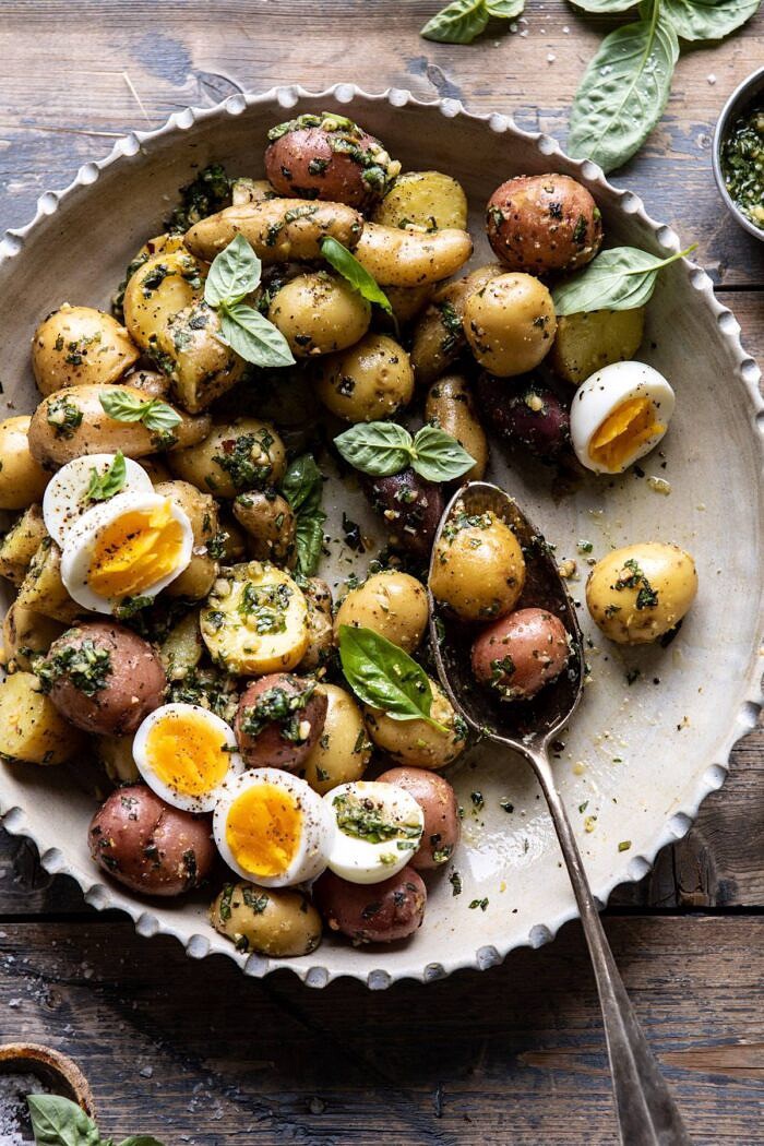 Pesto Potato Salad | halfbakedharvest.com #potatosalad #easyrecipes #pesto #summerrecipes overhead close up of Pesto Potato Salad with spoon in bowl