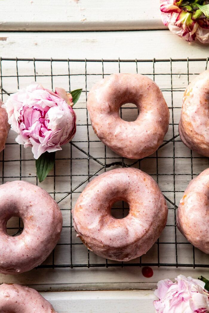 Strawberry Glazed Chai Doughnuts | halfbakedharvest.com #doughnuts #spring #strawberries overhead photo of Strawberry Glazed Chai Doughnuts