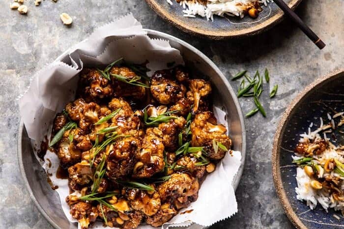 Better Than Takeout Kung Pao Cauliflower | halfbakedharvest.com #vegan #healthyrecipes #easyrecipes #vegetables horizontal photo of Better Than Takeout Kung Pao Cauliflower in a bowl