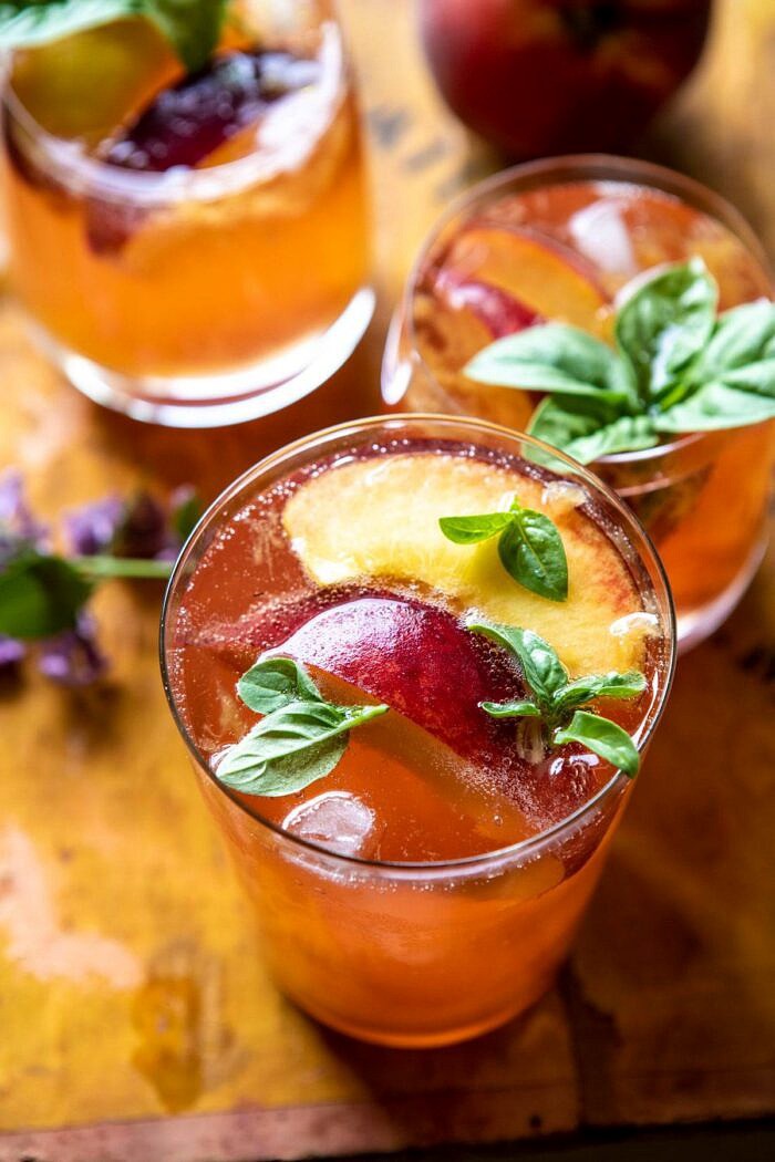 Balsamic Peach Spritz | halfbakedharvest.com #peach #peaches #wine #cocktail #drinks overhead photo of Balsamic Peach Spritz