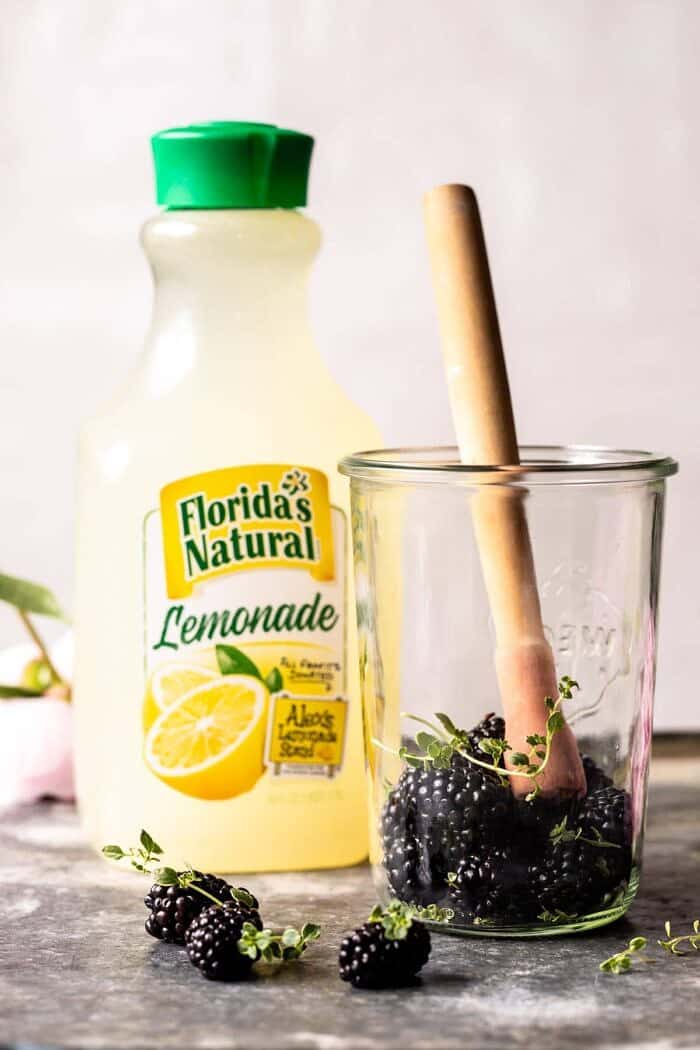 Blackberry Tequila Lemon Cooler | halfbakedharvest.com #cocktail #drinks #blackberries #tequila Blackberry Tequila Lemon Cooler being mixed in glass jar