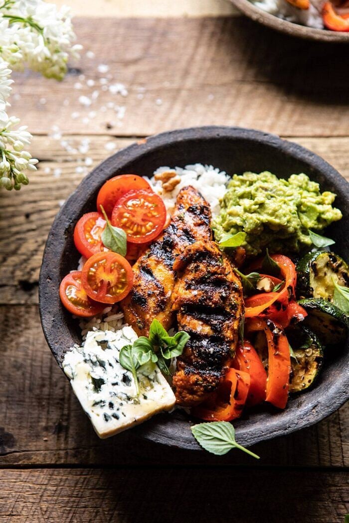 California Chicken, Veggie, Avocado and Rice Bowls | halfbakedharvest.com #chicken #chickenbowl #ricebowl #healthy side angled close up photo of California Chicken, Veggie, Avocado and Rice Bowls