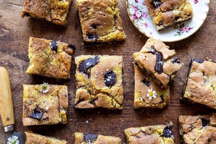 Crème Fraîche Chocolate Chunk Cookie Bars | halfbakedharvest.com #cookies #chocolatechipcookies #cookiebar horizontal photo of Crème Fraîche Chocolate Chunk Cookie Bars