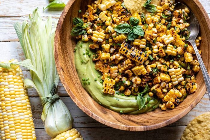 Grilled Street Corn Salad with Avocado Mayo | halfbakedharvest.com #corn #salad #easyrecipes #summer horizontal overhead photo of Grilled Street Corn Salad with Avocado Mayo