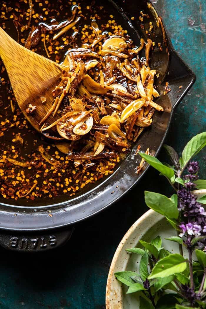 Spicy Peanut Noodles with Chili Garlic Oil | halfbakedharvest.com #peanutnoodles #easyrecipes #dinner #healthy Chili Garlic Oil in skillet