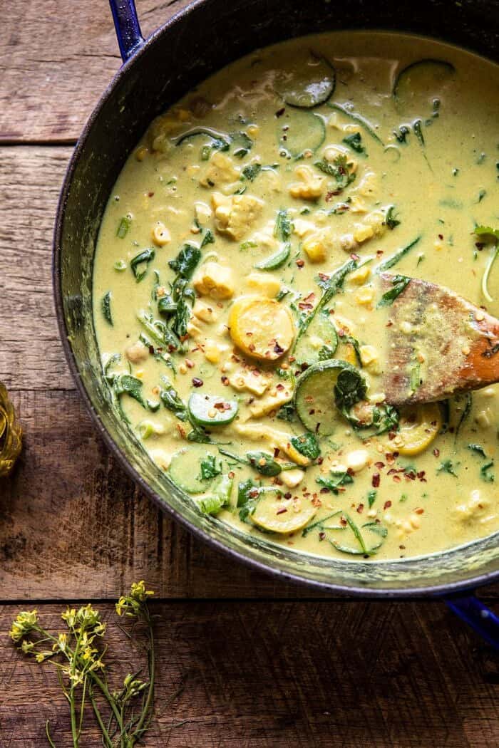 Summer Coconut Chickpea Curry with Rice and Fried Halloumi | halfbakedharvest.com #coconut #vegan #curry #easyrecipes #summer overhead photo of Summer Coconut Chickpea Curry in skillet