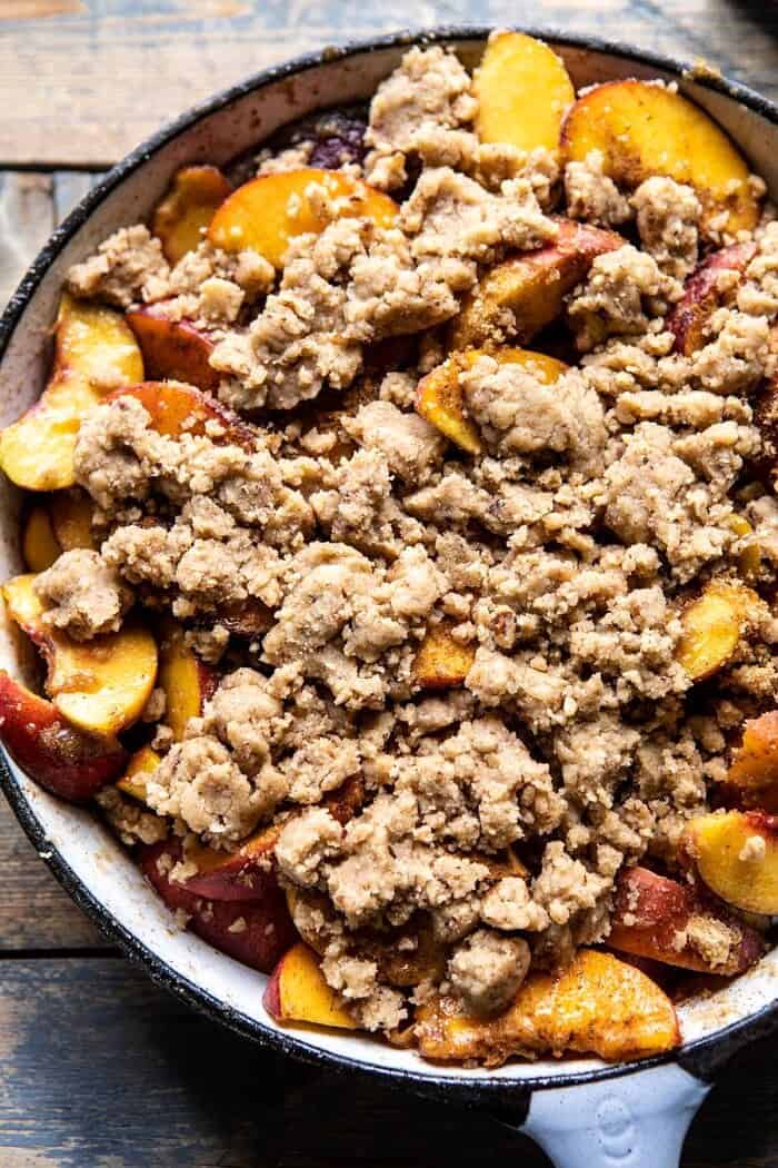 Skillet Brown Sugar Peach Cobbler | halfbakedharvest.com #peach #summer #easyrecipes #cobbler overhead photo of Skillet Brown Sugar Peach Cobbler before baking