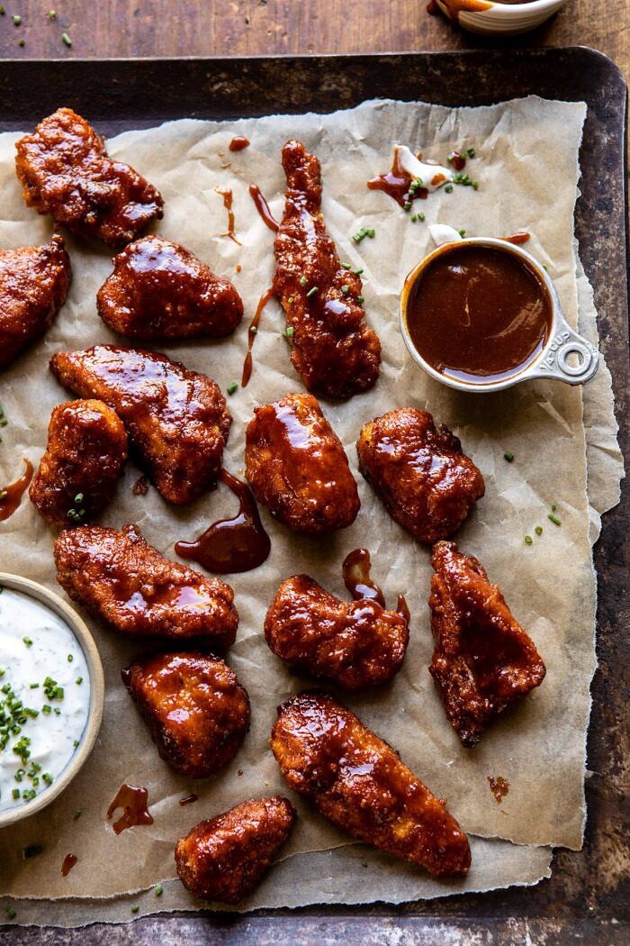 Baked Boneless Honey BBQ Chicken Wings with Spicy Ranch | halfbakedharvest.com #chicken #footballfood #bakedrecipes