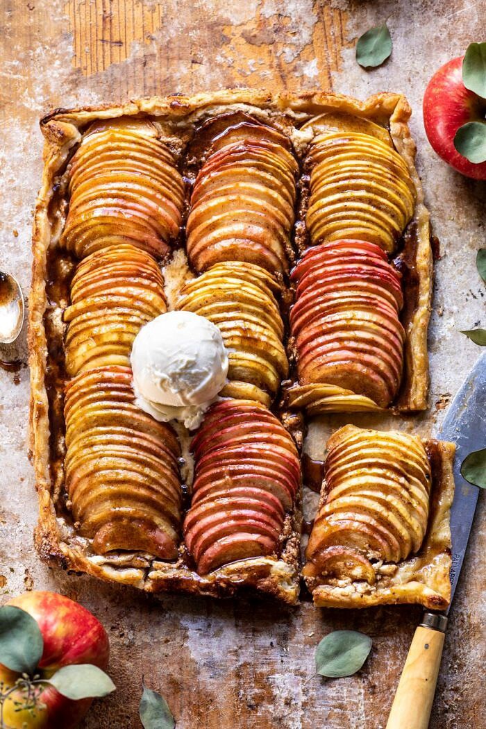 Chai Spiced Apple Ricotta Galette | halfbakedhavest.com #apple #pastry #fallrecipes #autumn overhead photo of Chai Spiced Apple Ricotta Galette with one slice cut