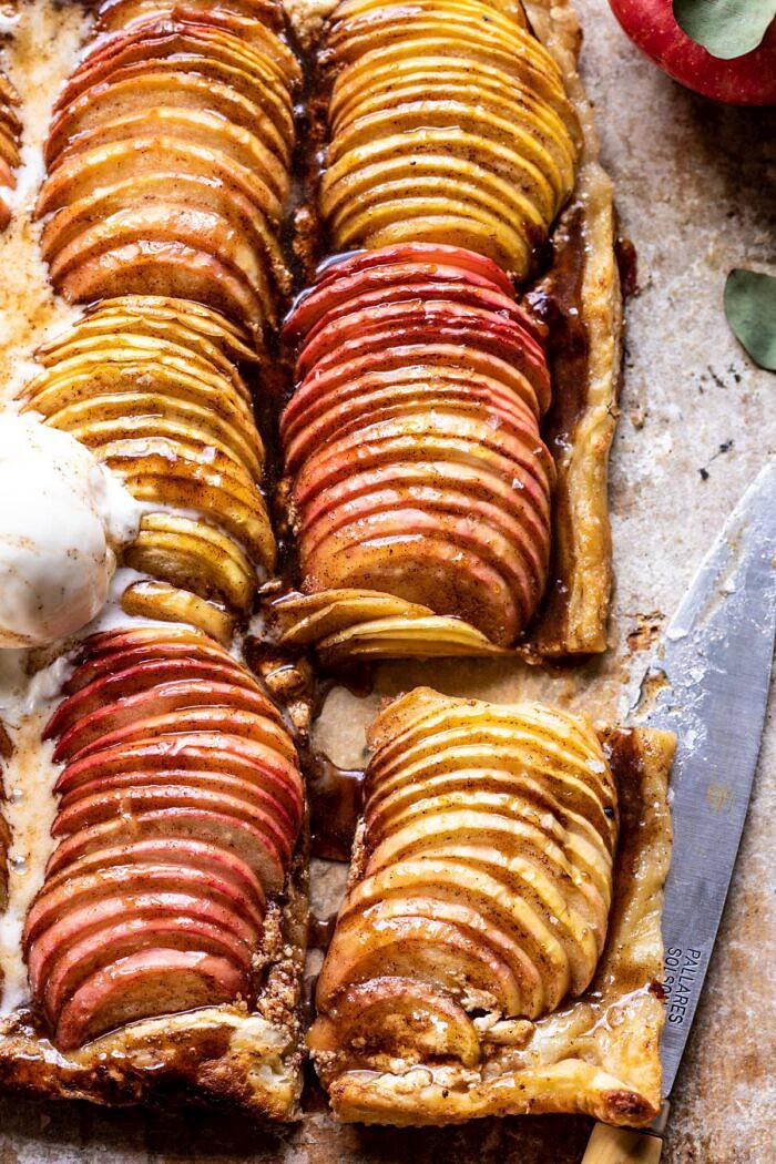 Chai Spiced Apple Ricotta Galette | halfbakedhavest.com #apple #pastry #fallrecipes #autumn overhead close up photo of Chai Spiced Apple Ricotta Galette with 1 slice cut out