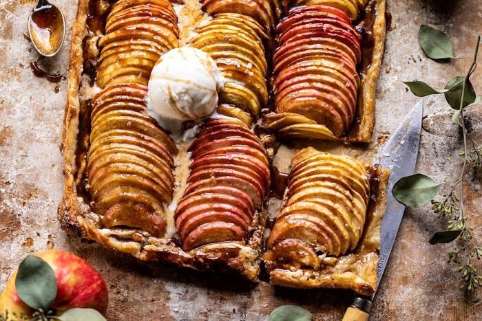 Chai Spiced Apple Ricotta Galette | halfbakedhavest.com #apple #pastry #fallrecipes #autumn horizontal photo of Chai Spiced Apple Ricotta Galette with one slice cut
