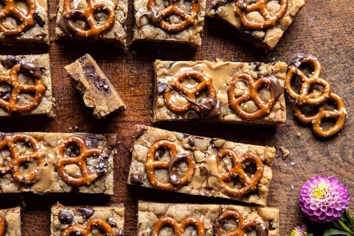 Chocolate Peanut Butter Pretzel Blondies | halfbakedharvest.com #peanutbutter #chocolate #pretzels #fall #autumn #dessert horizontal photo of Chocolate Peanut Butter Pretzel Blondies