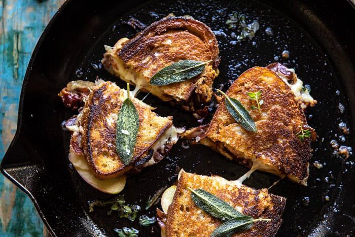 French Onion and Apple Grilled Cheese | halfbakedharvest.com #grilledcheese #frenchonion #easyrecipes #fall #autumn horizontal photo of French Onion and Apple Grilled Cheese in skillet