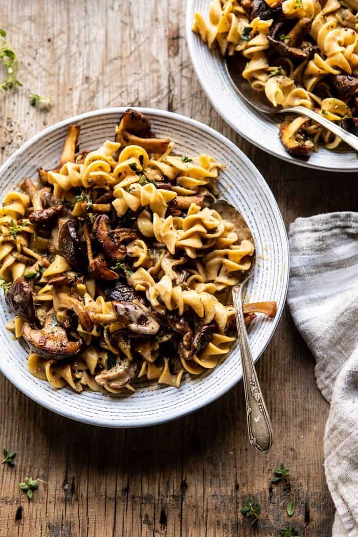 overhead photo of Herby Buttered Mushroom Stroganoff with spoon in bowl 
