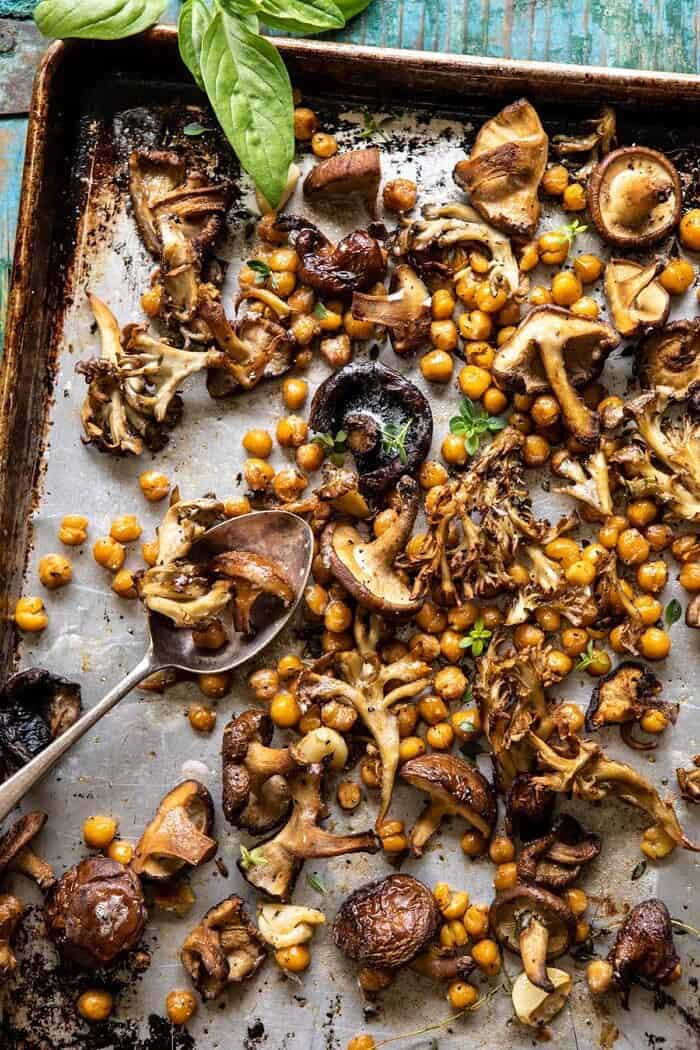Pesto Polenta with Thyme Roasted Mushrooms and Chickpeas | halfbakedharvest.com #pesto #polenta #mushrooms #easyrecipes overhead photo of Thyme Roasted Mushrooms and Chickpeas on baking sheet