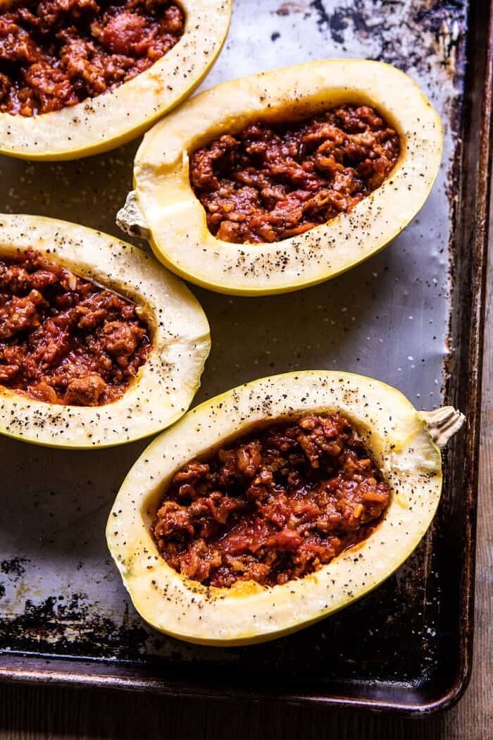 overhead photo of Roasted Garlic Spaghetti Squash Lasagna Boats before baking 