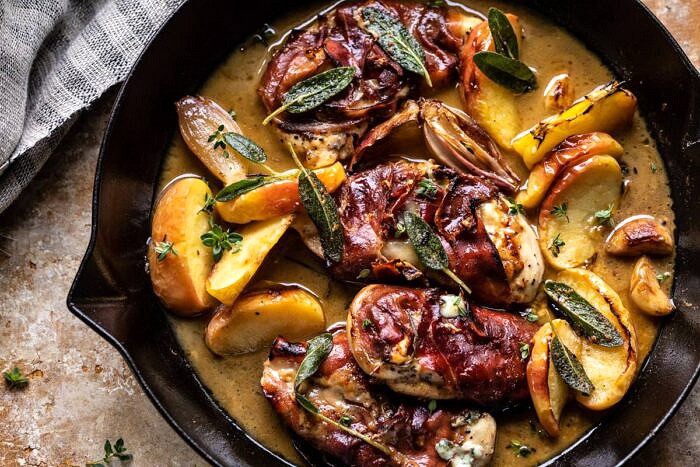 Prosciutto Apple and Sage Butter Chicken with Cider Pan Sauce | halfbakedharvest.com #chicken #apples #fallrecipes #skillet horizontal photo of Prosciutto Apple and Sage Butter Chicken with Cider Pan Sauce in skillet