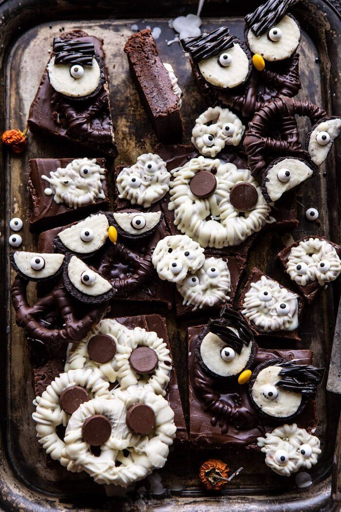 BOO! Spooky Monster Chocolate Covered Pretzel Brownies | halfbakedharvest.com #halloween #brownies #easyrecipes #dessert #fall overhead photo of BOO! Spooky Monster Chocolate Covered Pretzel Brownies after being cut into bars