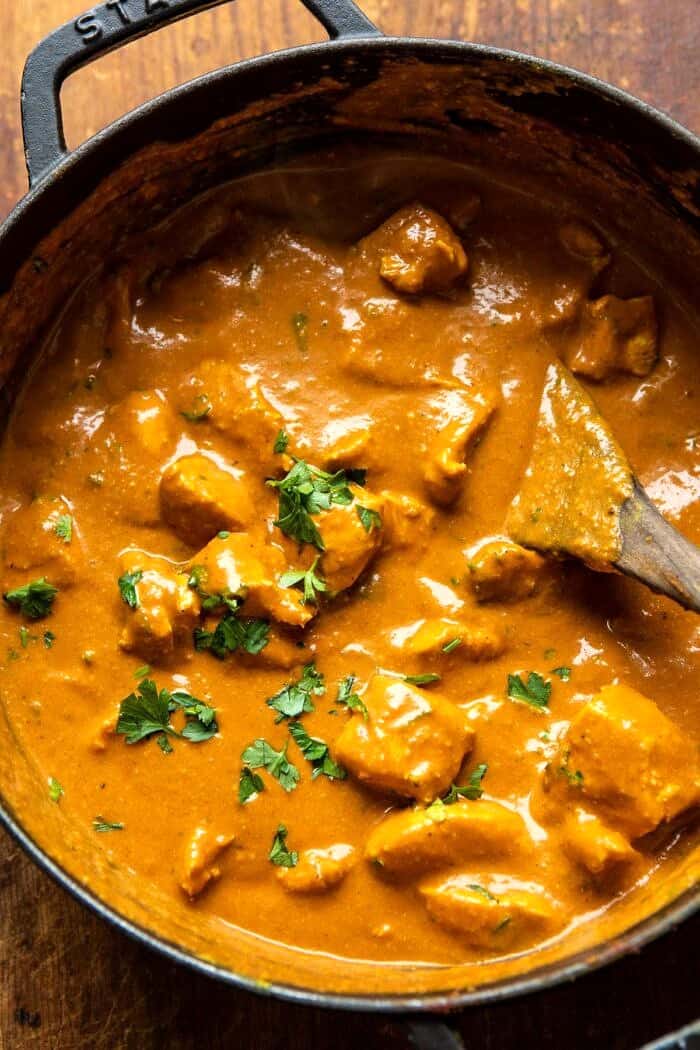 Super Simple Coconut Chicken Tikka Masala | halfbakedharvest.com #Indian #healthyrecipes #chicken #easy #fast overhead photo of Super Simple Coconut Chicken Tikka Masala in skillet