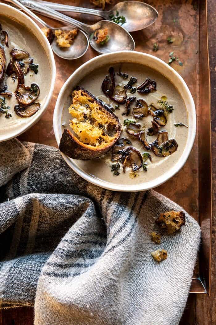 overhead photo of Cream of Mushroom Soup with Garlic Herb Breadcrumbs 