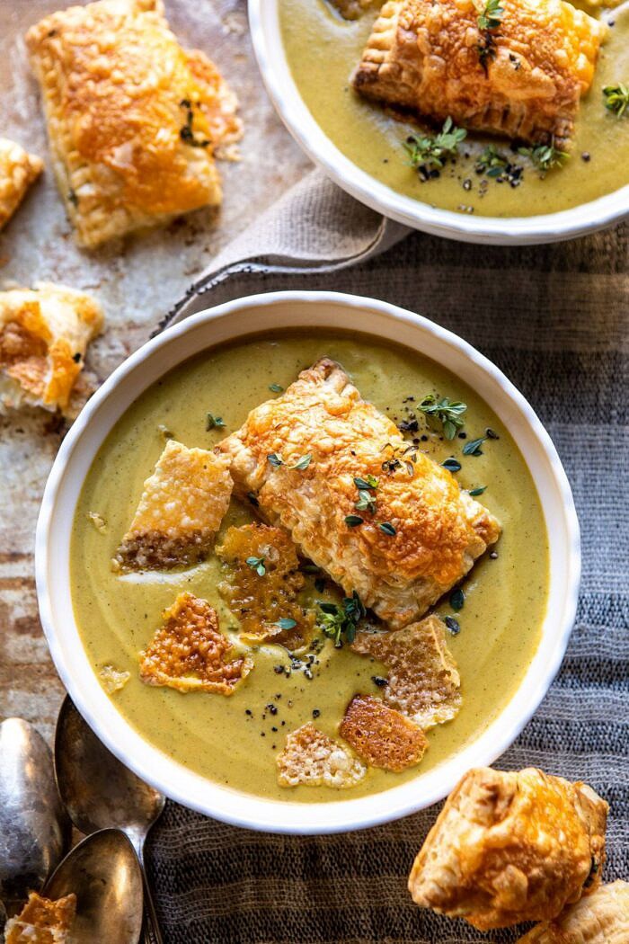 Creamy Broccoli and Butternut Squash Soup with Cheddar Brie Pastries | halfbakedharvest.com #soup #butternutsquash #cheese #fallrecipes overhead close up photo of Creamy Broccoli and Butternut Squash Soup with Cheddar Brie Pastries