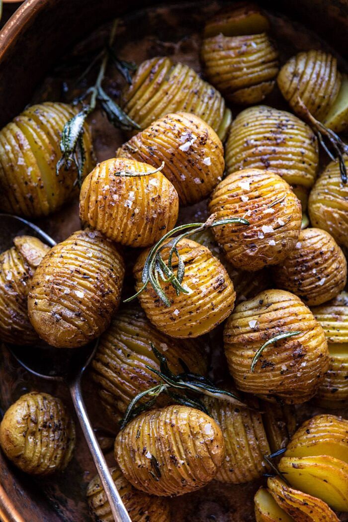 Crispy Rosemary Butter Roasted Potatoes | halfbakedharvest.com #potatoes #fall #autumn #Thanksgiving #Christmas overhead close up photo of Crispy Rosemary Butter Roasted Potatoes