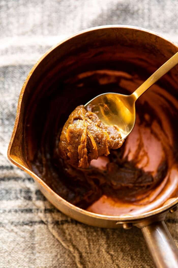 Pumpkin Butter Chocolate Chip Cookies | halfbakedharvest.com #pumpkin #cookies #chocolatechipcookies #fallrecipes Pumpkin Butter on spoon