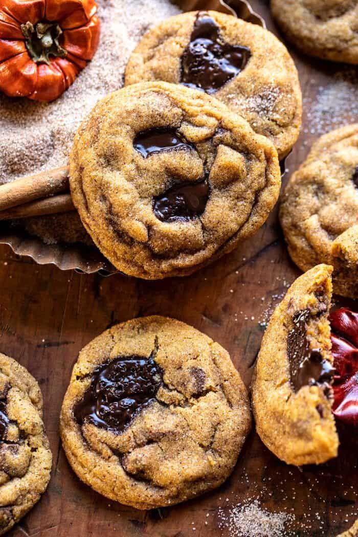 Pumpkin Butter Chocolate Chip Cookies | halfbakedharvest.com #pumpkin #cookies #chocolatechipcookies #fallrecipes overhead close up photo of Pumpkin Butter Chocolate Chip Cookies