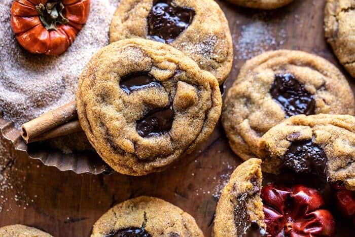 Pumpkin Butter Chocolate Chip Cookies | halfbakedharvest.com #pumpkin #cookies #chocolatechipcookies #fallrecipes horizontal overhead photo of Pumpkin Butter Chocolate Chip Cookies