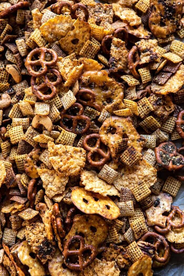 Spicy Ranch Chex Mix | halfbakedharvest.com #appetizers #snacks #easyrecipes #gameday #christmas #thanksgiving overhead close up photo of Spicy Ranch Chex Mix