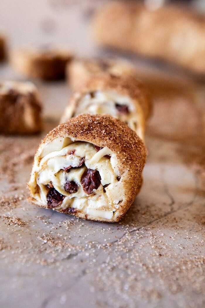 5 Ingredient Cranberry Brie Cinnamon Puff Pastry Swirls | halfbakedharvest.com #brie #cranberries #thanksgiving #christmas 5 Ingredient Cranberry Brie Cinnamon Puff Pastry log before baking