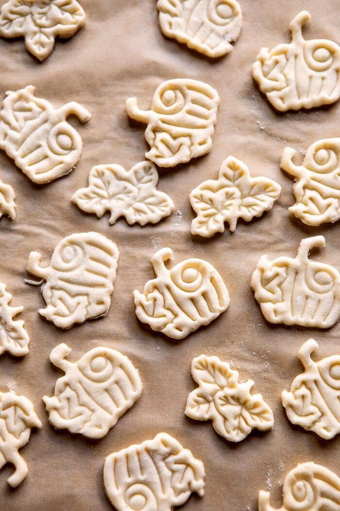 Burnt Basque Pumpkin Spice Cheesecake | halfbakedharvest.com #pumpkin #cheesecake #thanksgiving overhead photo of pie crust cookies before baking