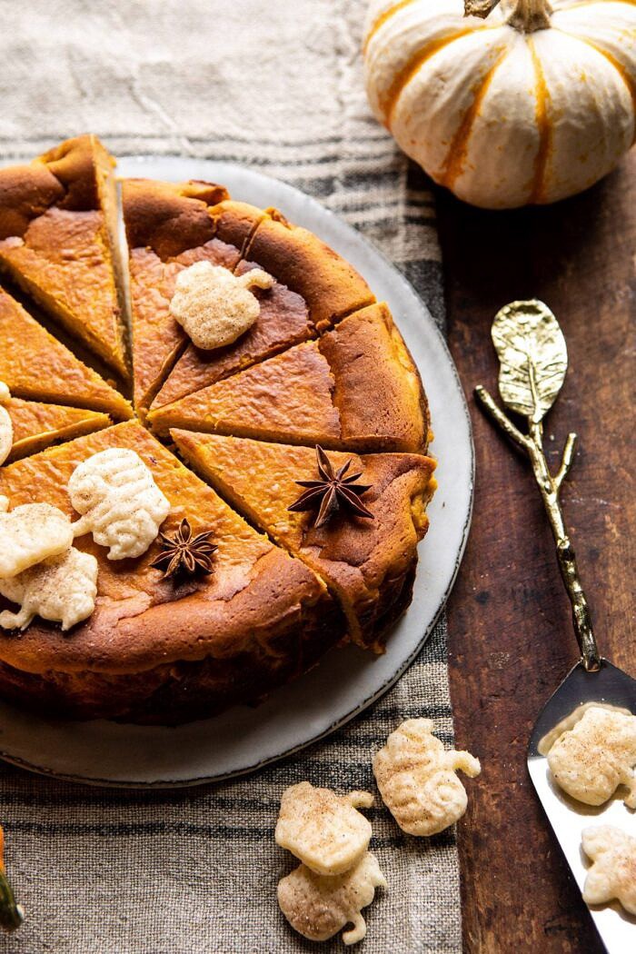 Burnt Basque Pumpkin Spice Cheesecake | halfbakedharvest.com #pumpkin #cheesecake #thanksgiving side angled close up photo of Burnt Basque Pumpkin Spice Cheesecake