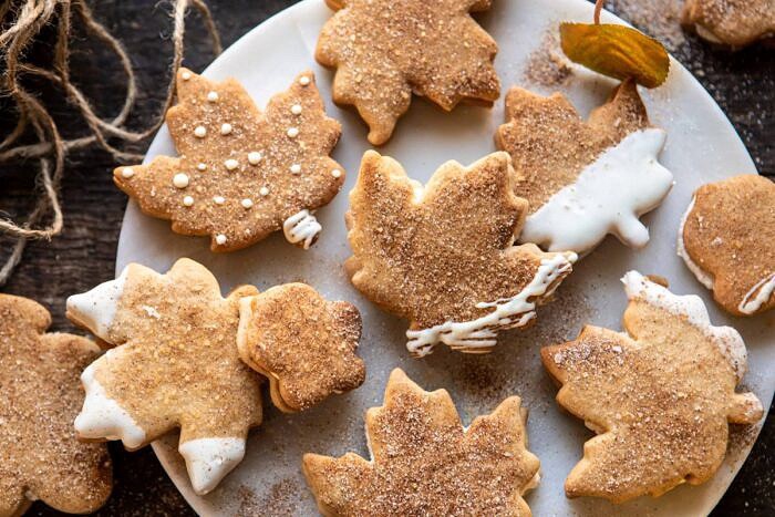 Chai Spiced Maple Sugar Cookies with Browned Butter Frosting | halfbakedharvest.com #cookies #thanksgiving #dessert #holiday #sugarcookies horizontal photo of Chai Spiced Maple Sugar Cookies with Browned Butter Frosting