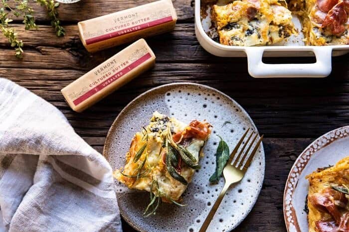 Roasted Butternut Squash and Spinach Lasagna | halfbakedharvest.com #lasagna #holiday #thanksgiving horizontal photo of Roasted Butternut Squash and Spinach Lasagna slice on serving plate with fork