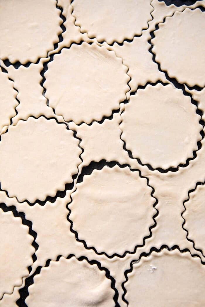 Cheddar Pierogies with Caramelized Onions and Bacon | halfbakedharvest.com #pierogi #homemade #Christmas Pierogies dough