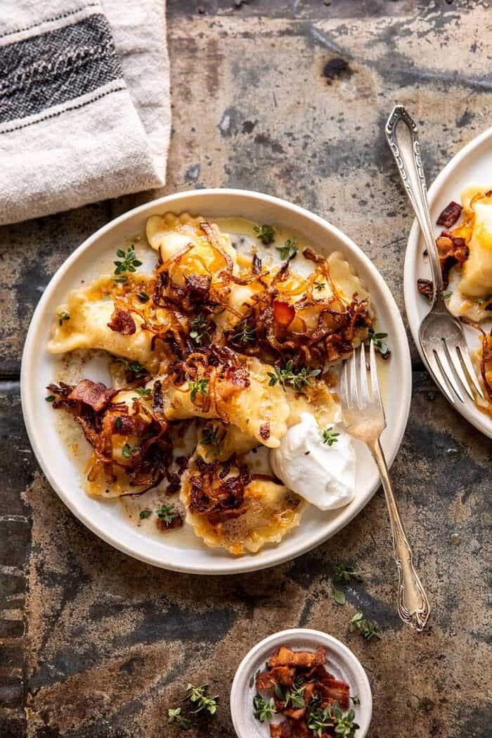 Cheddar Pierogies with Caramelized Onions and Bacon | halfbakedharvest.com #pierogi #homemade #Christmas overhead photo of Cheddar Pierogies with Caramelized Onions and Bacon