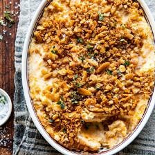 Cheesy Potato Casserole with Buttery Ritz Crackers | halfbakedharvest.com #cheesypotatoes #Christmasrecipes #potatocasserole