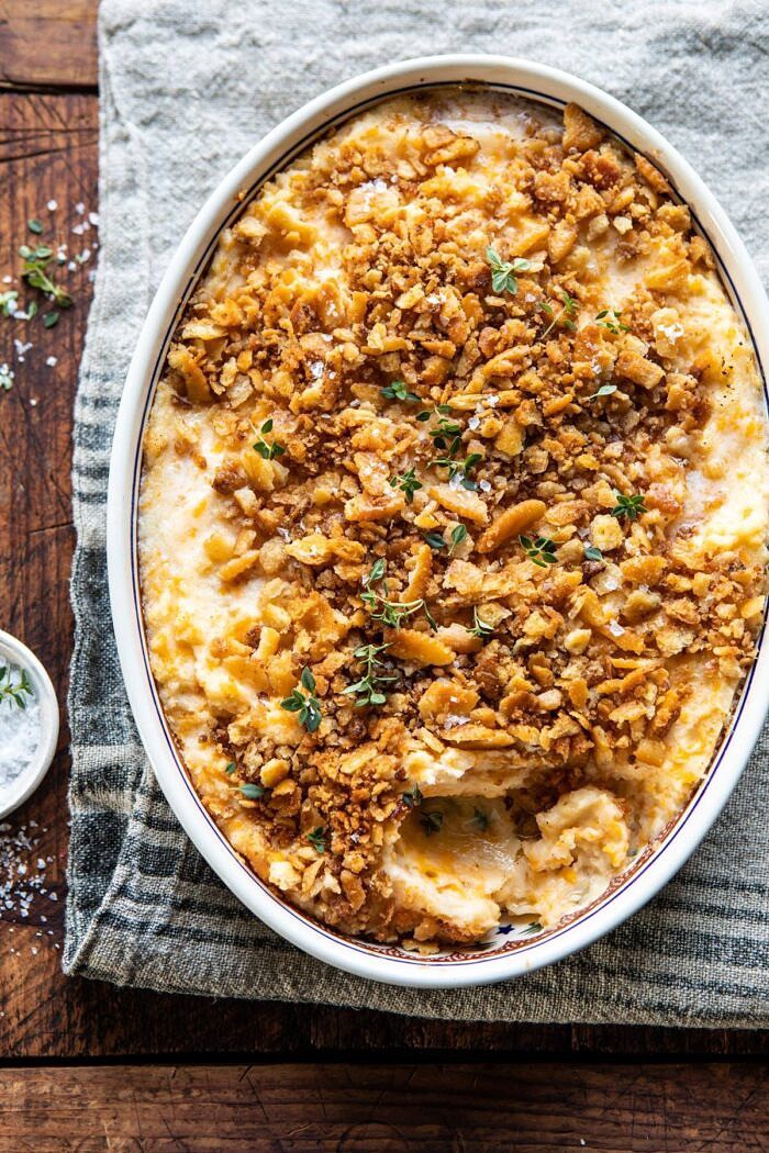Cheesy Potato Casserole with Buttery Ritz Crackers | halfbakedharvest.com #cheesypotatoes #Christmasrecipes #potatocasserole overhead photo of Cheesy Potato Casserole with Buttery Ritz Crackers