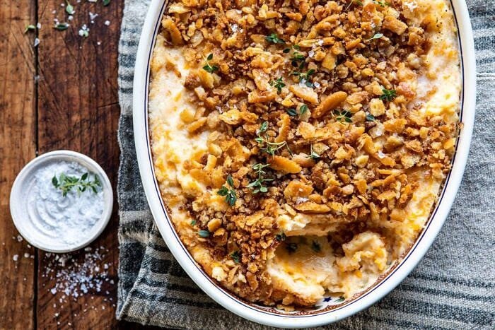 Cheesy Potato Casserole with Buttery Ritz Crackers | halfbakedharvest.com #cheesypotatoes #Christmasrecipes #potatocasserole horizontal photo of Cheesy Potato Casserole with Buttery Ritz Crackers