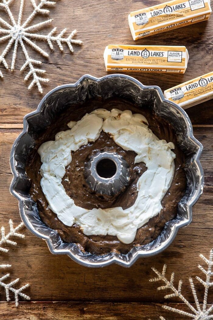 Cream Cheese Swirled Chai Gingerbread Cake | halfbakedharvest.com #gingerbread #cake #Christmas #dessert overhead photo of Cream Cheese Swirled Chai Gingerbread Cake before baking with the cream cheese layer showing