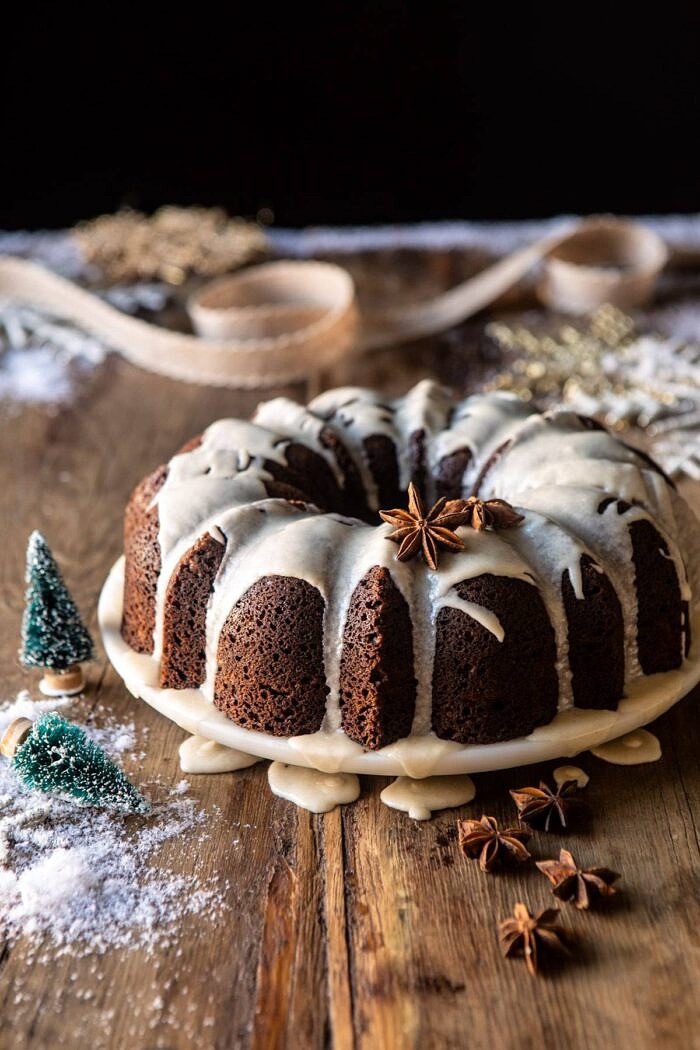 Cream Cheese Swirled Chai Gingerbread Cake | halfbakedharvest.com #gingerbread #cake #Christmas #dessert side angled photo of Cream Cheese Swirled Chai Gingerbread Cake