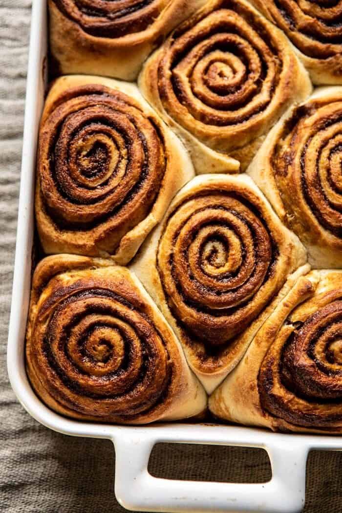 Easy Gingerbread Brioche Cinnamon Rolls | halfbakedharvest.com #cinnamonrolls #gingerbread overhead close up photo of Easy Gingerbread Brioche Cinnamon Rolls before adding frosting
